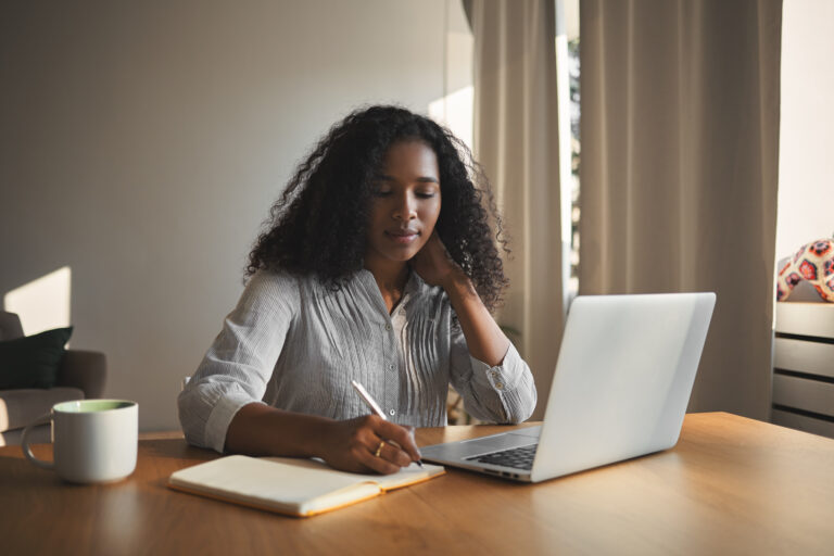 Woman sitting on a desk